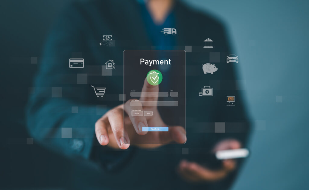 Digital banking network, internet payment, financial technology or FinTech concept. Businessman using smartphone with icons on virtual screen, online shopping and payment via mobile banking apps.